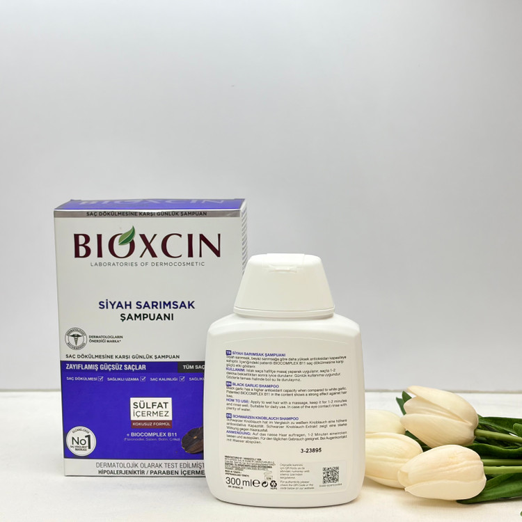 شامپو ضد ریزش مو کیفیت اصلی مدل سیر سیاه حجم 300 میل تقویتکننده ریشه مو، حاوی آنتیاکسیدان و ویتامین، مناسب انواع موها، فاقد پارابن و فتالات