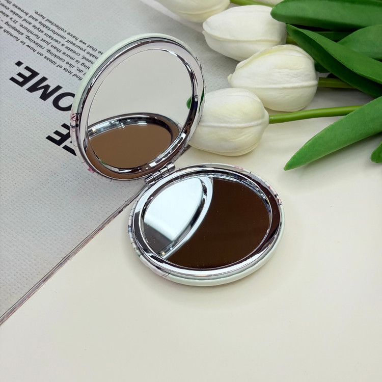 آینه جیبی دوطرفه طرح گلدار چرمی دایره ای7cm
