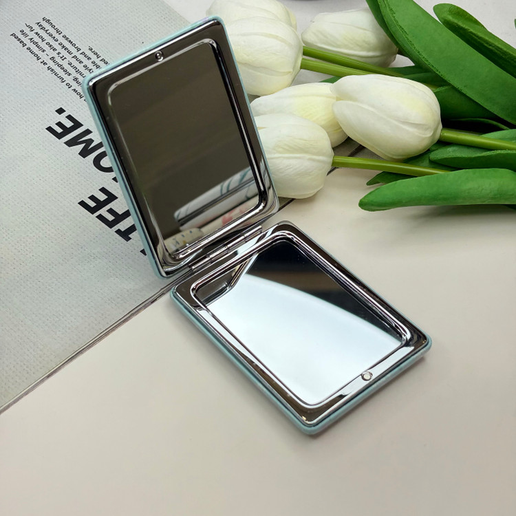 آینه جیبی دوطرفه طرح گلدار ریز مستطیلی چرم 8.5cm در 6cm