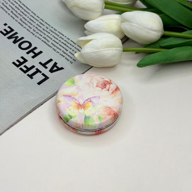 آینه جیبی دوطرفه طرح گلدار دایره ای چرم 6cm