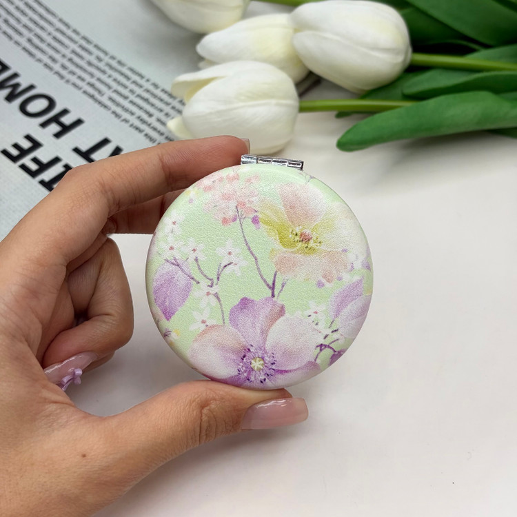 آینه جیبی دوطرفه طرح گلدار دایره ای چرم 6cm