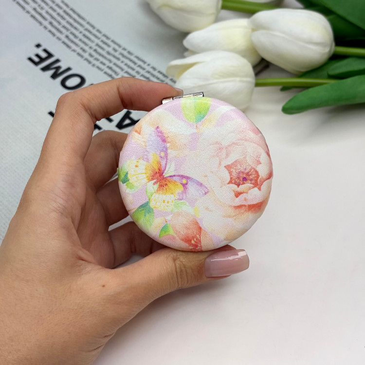 آینه جیبی دوطرفه طرح گلدار دایره ای چرم 6cm