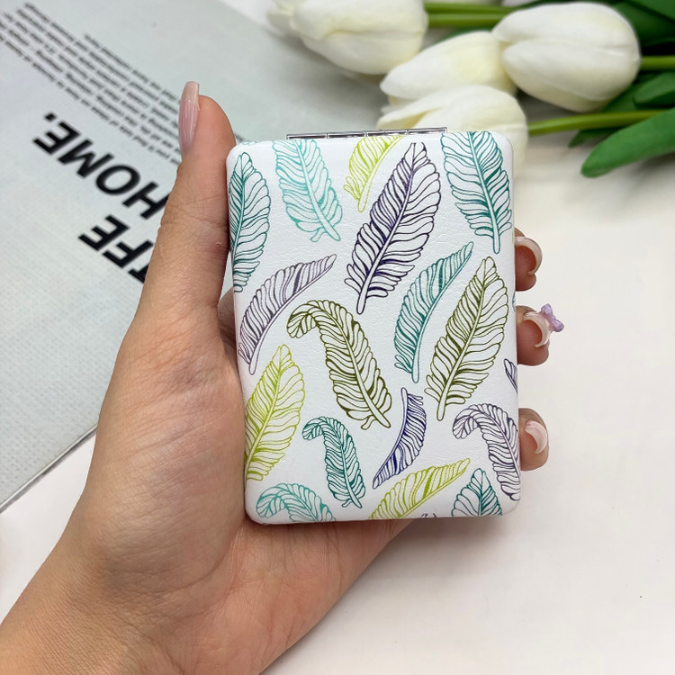 آینه جیبی دوطرفه طرح برگ مستطیلی چرم 8.5cm در 6cm