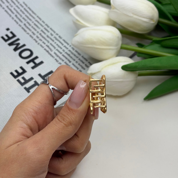 کلیپس فلزی طرح کروسان سایز کوچک رنگ طلایی2.5cm