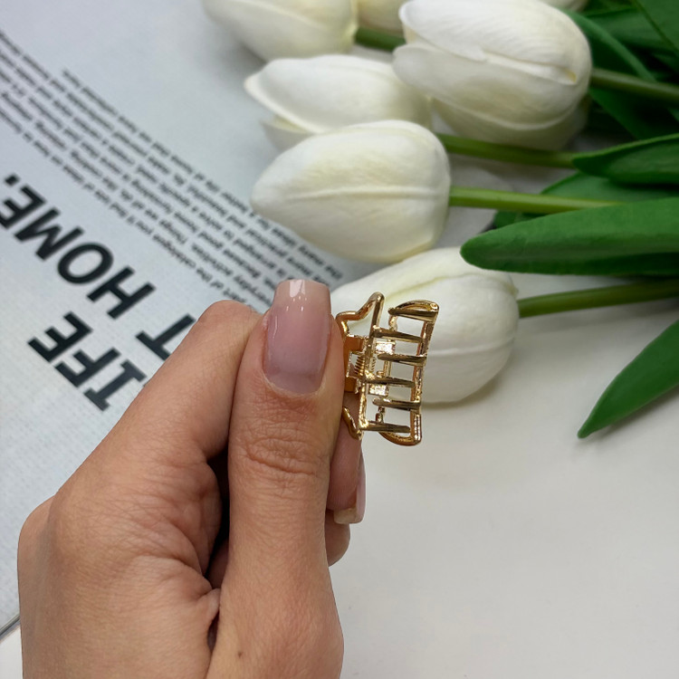 کلیپس فلزی طرح گربه سایز کوچک رنگ طلایی2.5cm