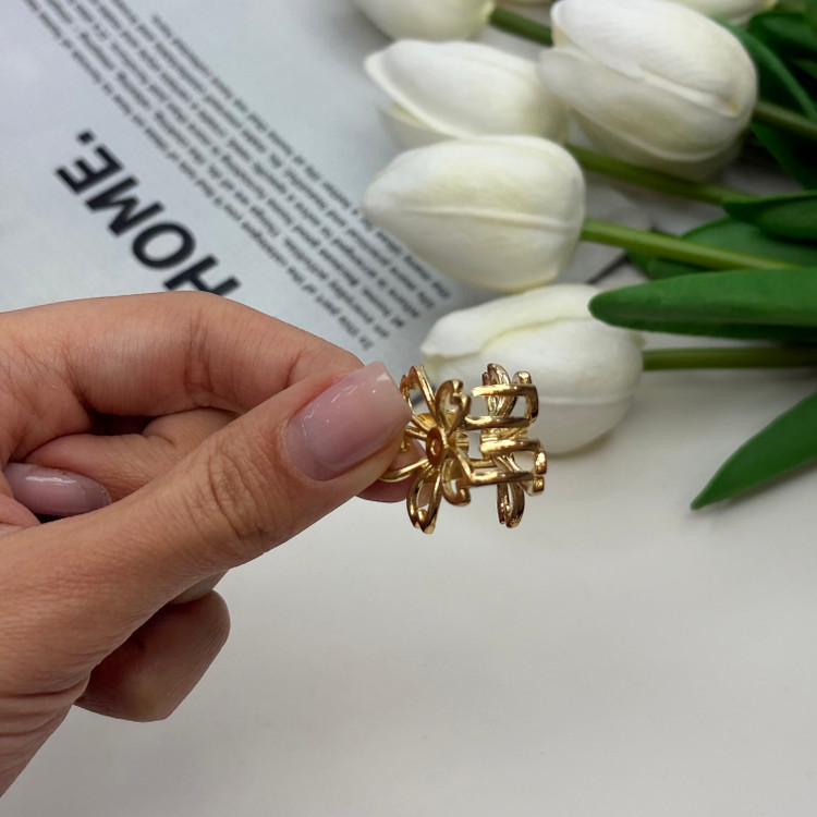 کلیپس فلزی طرح گل سایز کوچک رنگ طلایی2cm