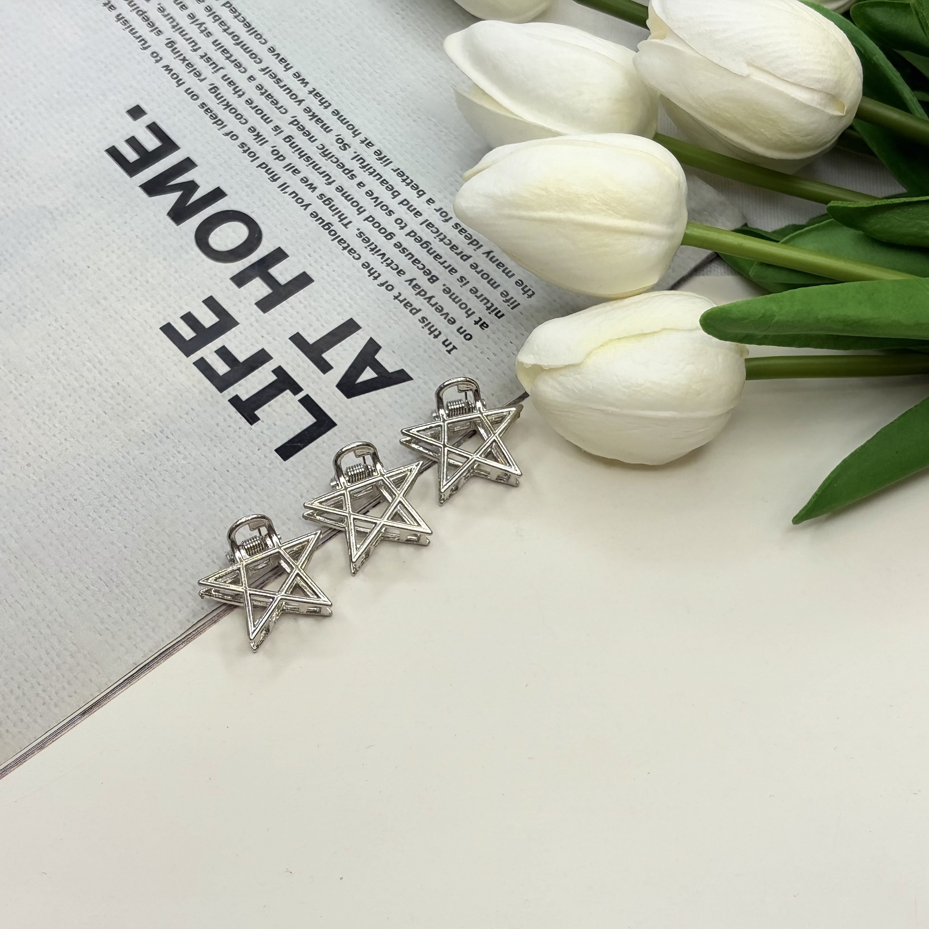 کلیپس فلزی طرح ستاره سایز کوچک رنگ نقره ای2.5cm
