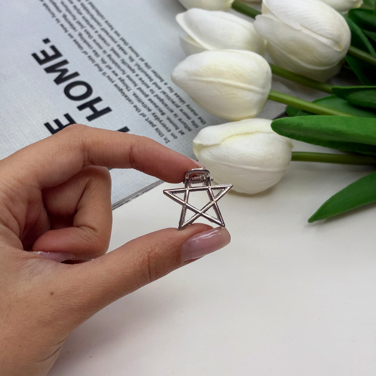 کلیپس فلزی طرح ستاره سایز کوچک رنگ نقره ای2.5cm