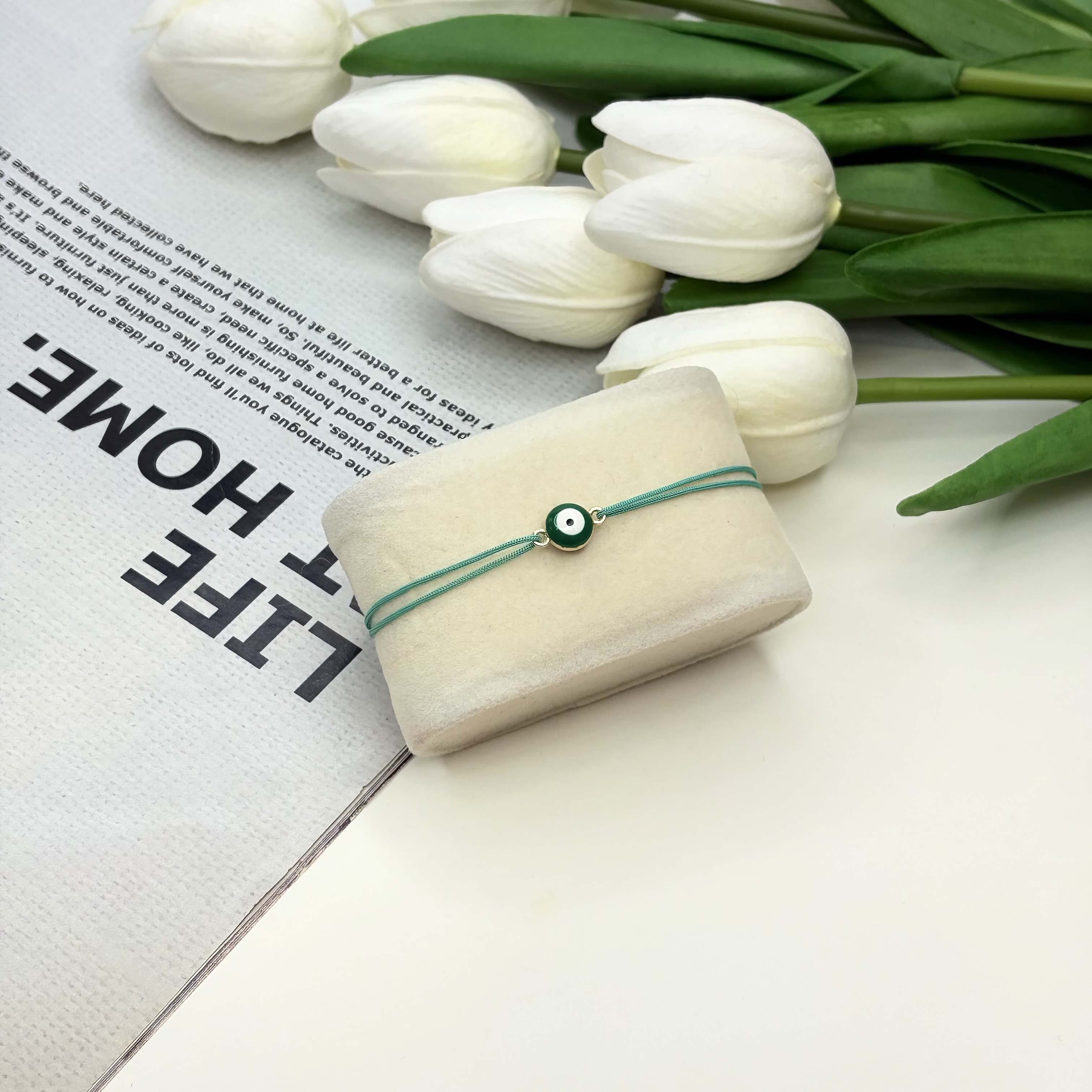 دستبند چشم زخم استیل رنگ سبز فیروزه ای فری سایز گره کشویی نخی مناسب نوزاد تا بزرگسال۲۸cm