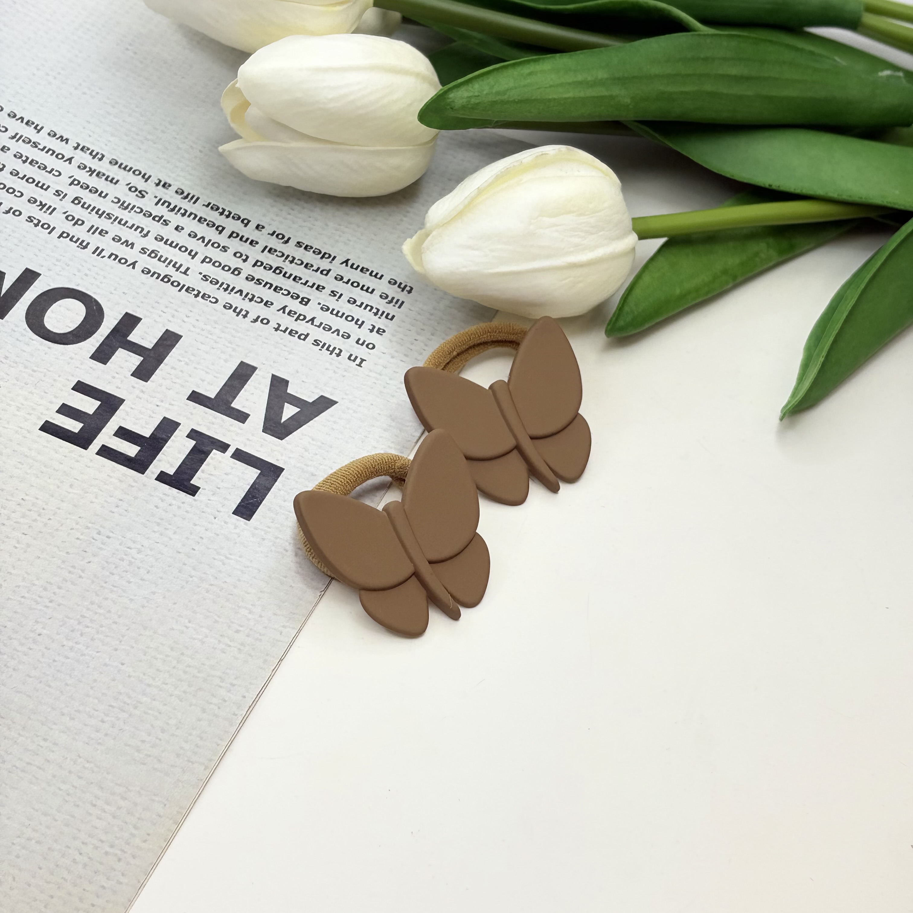 کش مو جفتی پیکسل دار حوله ای طرح پروانه رنگ قهوه ای