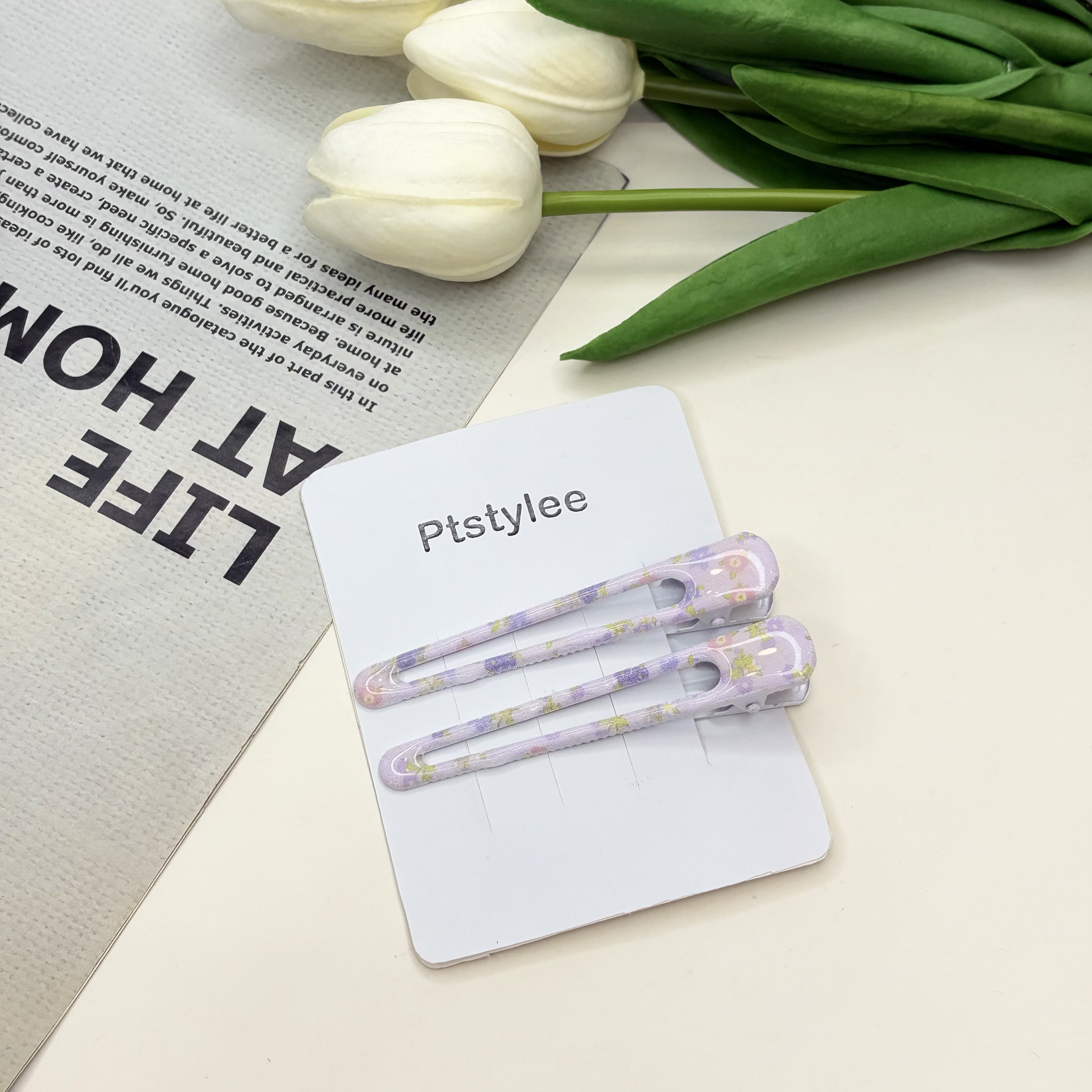 گیره مو جفتی براق انبری طرح گلدار و‌پینترستی براق رنگ‌ بنفش6cm