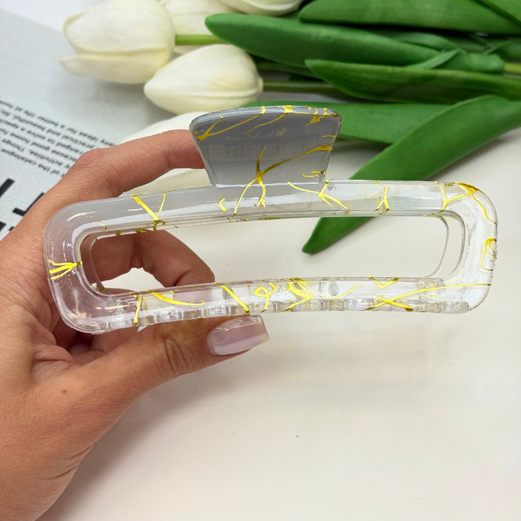 کلیپس مستطیلی طرح ماربل طلایی نیمه شفاف سایز بزرگ۱۱cm