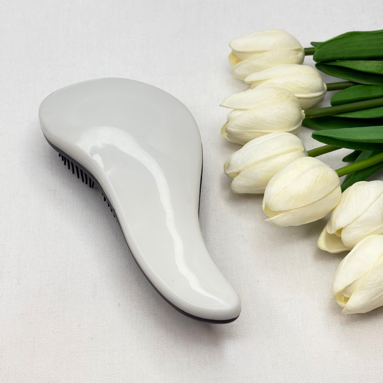 برس مو گره بازکن مدل منحنی مناسب موهای فر و صاف رنگ سفید مشکی
