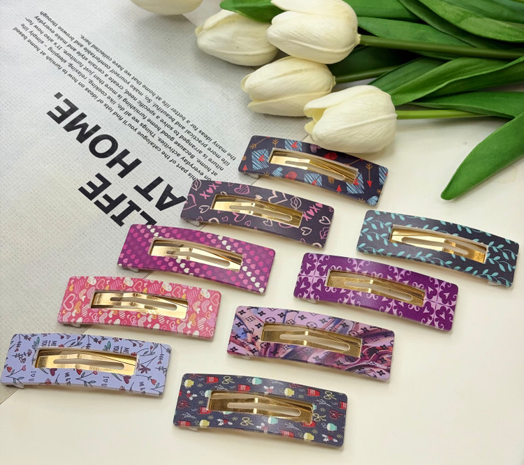 گیره مو تق تقی طرح دار مدل مستطیل توخالی 7cm