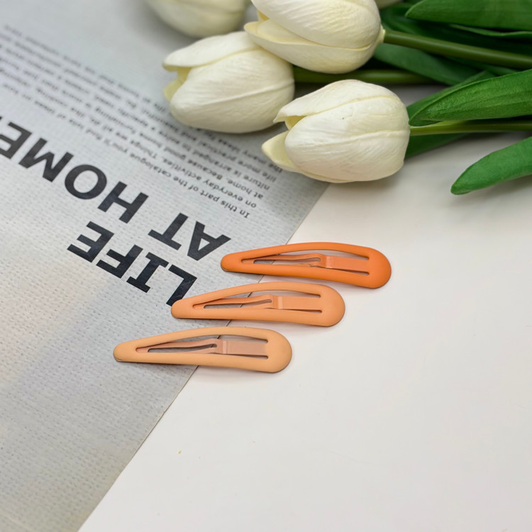 پک سه تایی گیره مو تق تقی مات تناژ رنگی نارنجی ۶cm