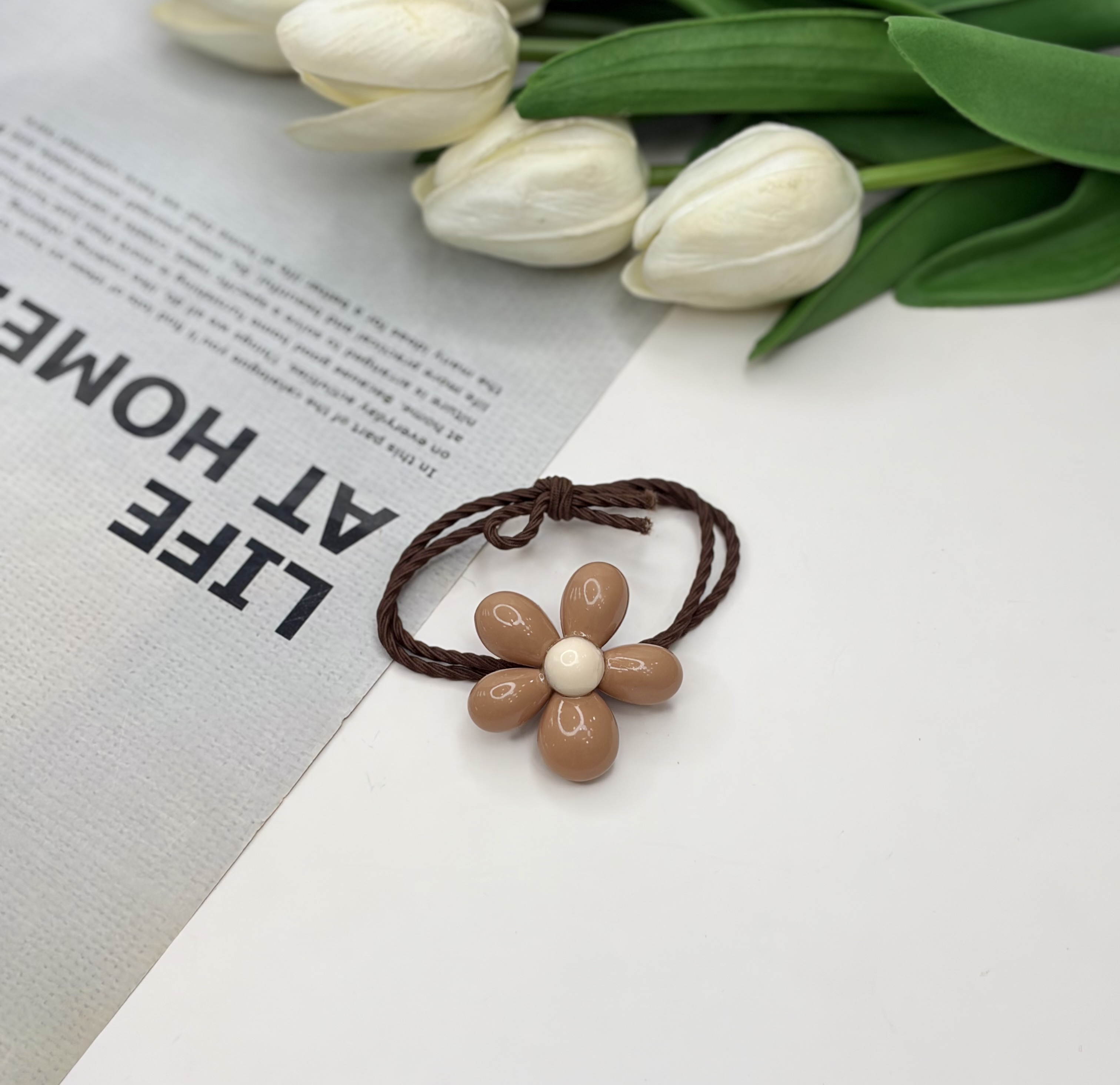 کش مو پیکسل دار طرح گل رنگ‌ نود