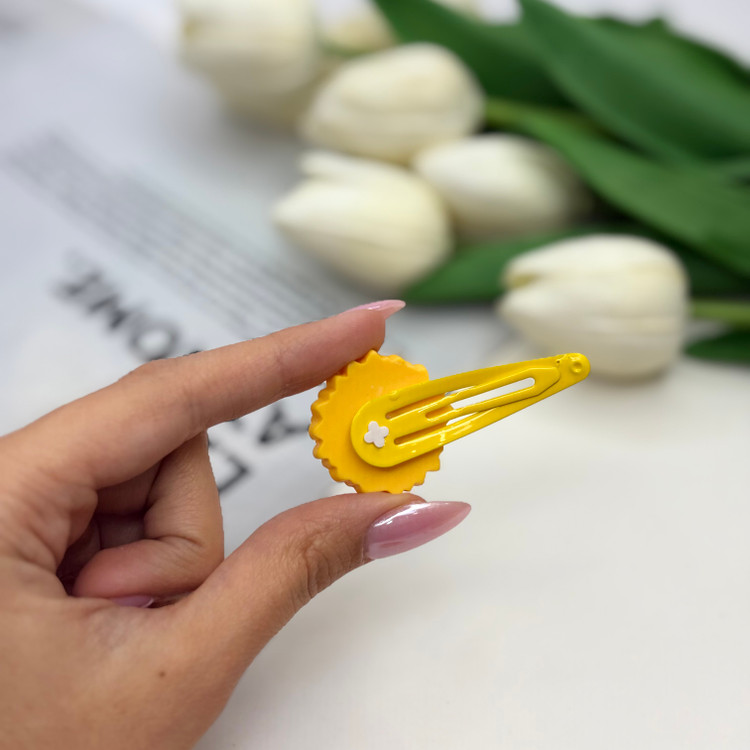 گیره مو تق تقی جفتی طرح گل آفتابگردون5.5 سانت