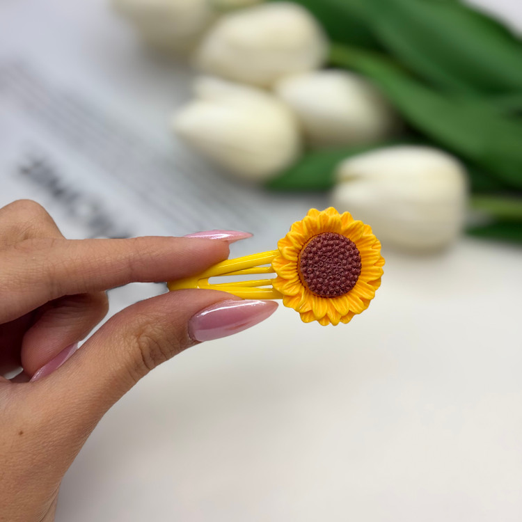 گیره مو تق تقی جفتی طرح گل آفتابگردون5.5 سانت