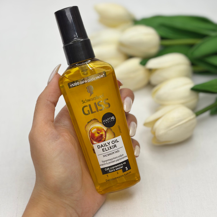 روغن مو مدل Daily Oil حاوی روغن آرگان و ویتامین E مناسب انواع مو و حجم 75 میل، درخشانکننده و ترمیمکننده موهای خشک و آسیبدیده
